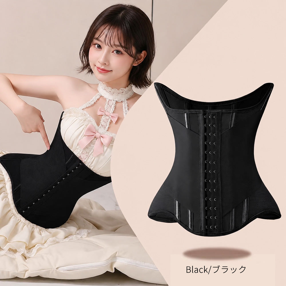 A black waist trainer corset shown on a model wearing a cream lace halter dress, alongside a clean product shot of the back of the corset. The image is split diagonally with Japanese text 'Black/ブラック' at the bottom right.