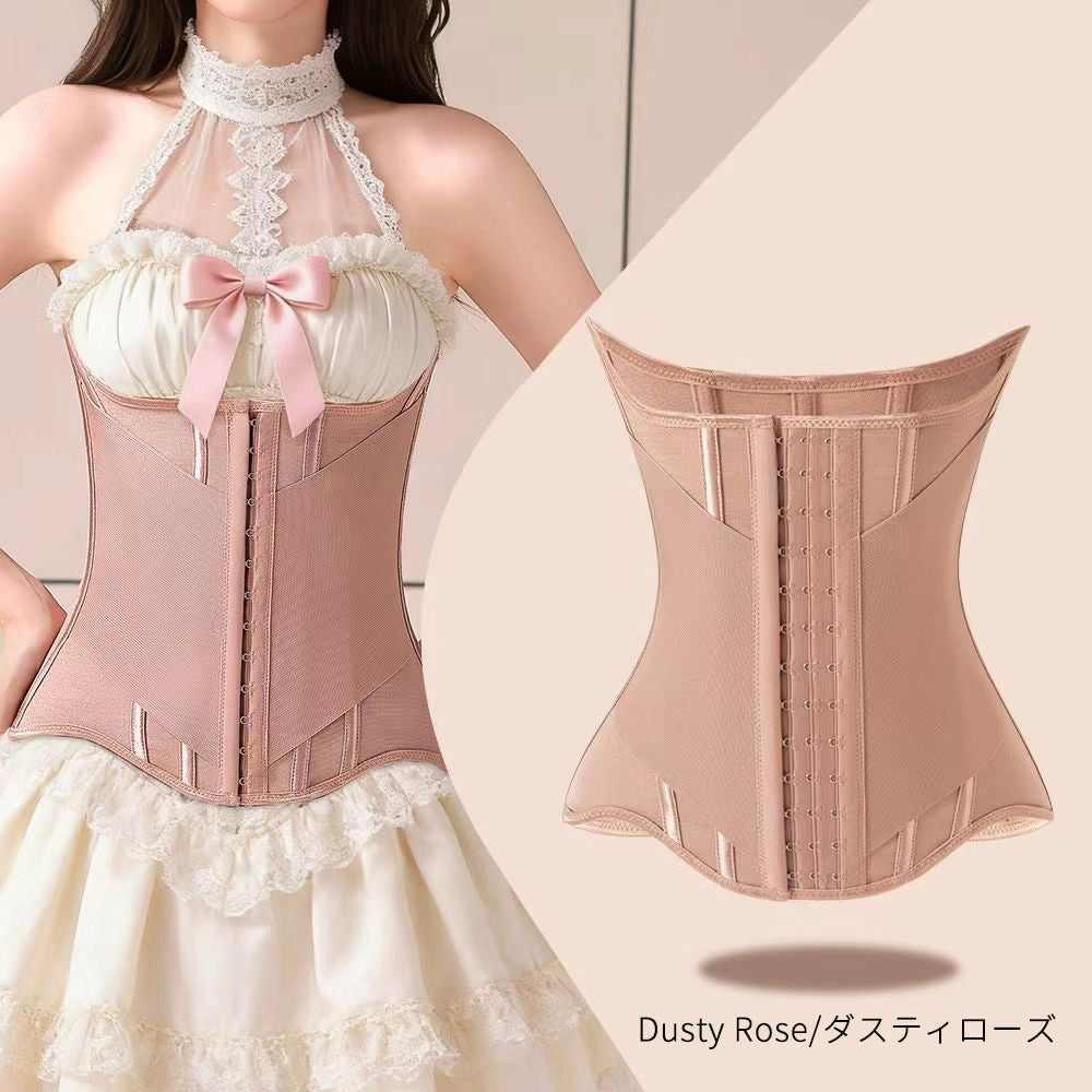 A dusty rose structured waist trainer corset shown on a model wearing a cream lace halter dress, alongside a flat product view of the corset. The text 'Dusty Rose/ダスティローズ' is visible at the bottom right.