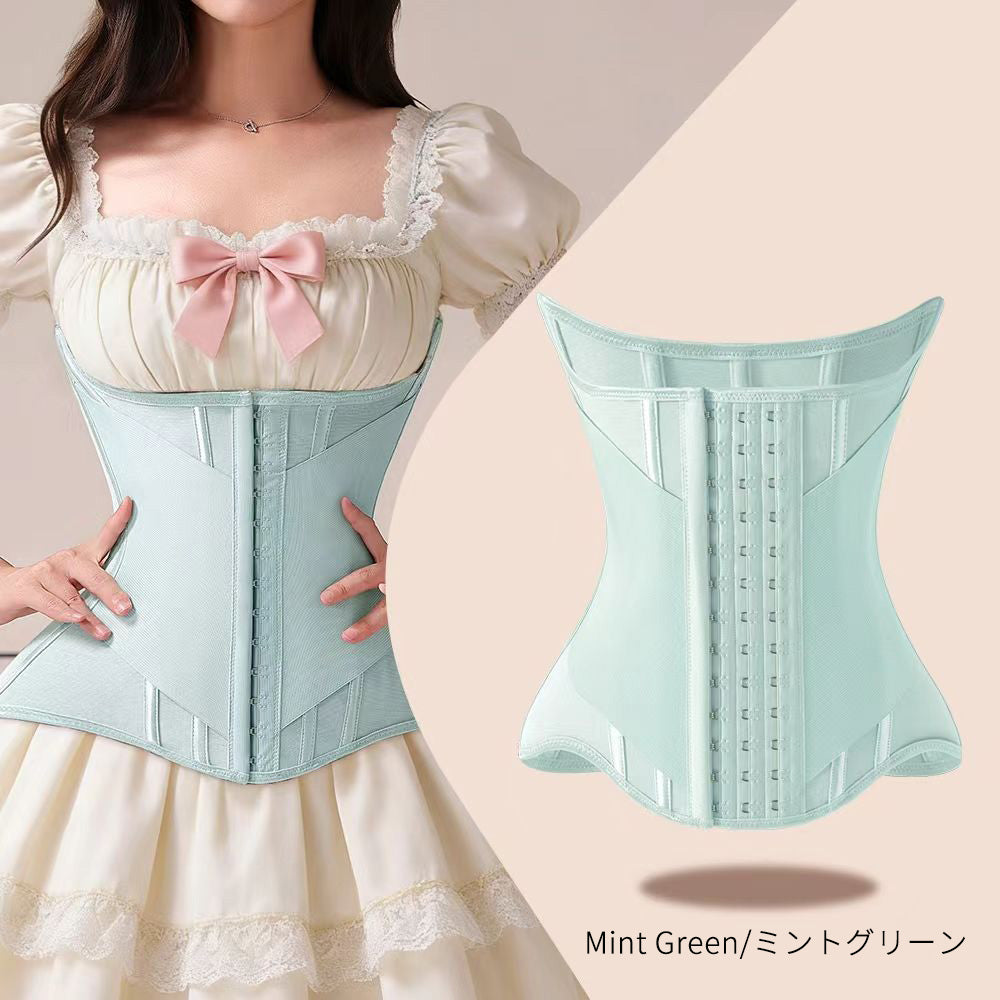 A mint green waist trainer corset shown on a model wearing a cream dress, alongside a standalone view of the corset on the right. The text 'Mint Green/ミントグリーン' is visible at the bottom right.