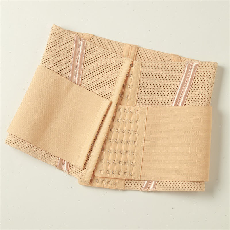 A beige mesh and fabric compression/support belt folded neatly on a light off-white background.